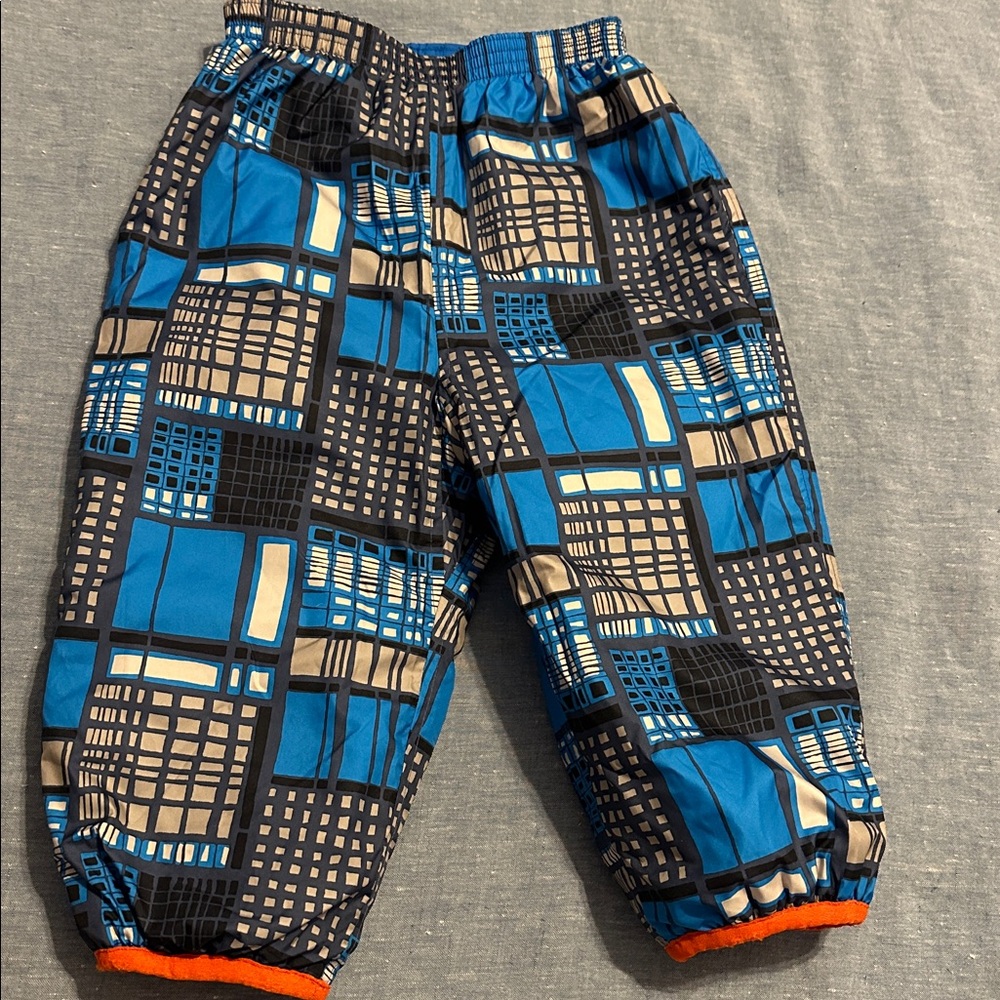 Patagonia REVERSIBLE SnowPants.Quilted Puff.Blue box design & solid blue.EUC